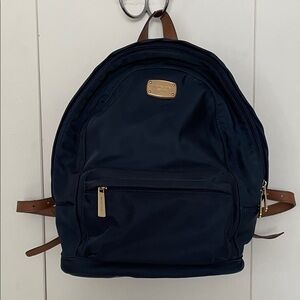 Elegant Michael Kors Navy and Tan Backpack